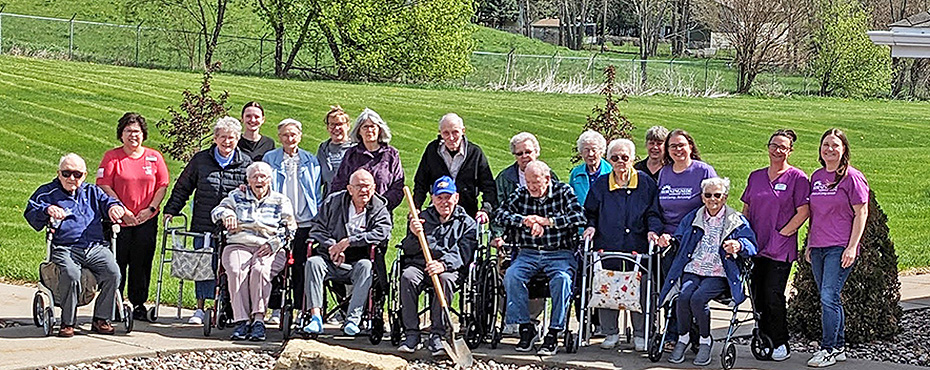 Morningside folks plant a flowering crab tree for Arbor Day